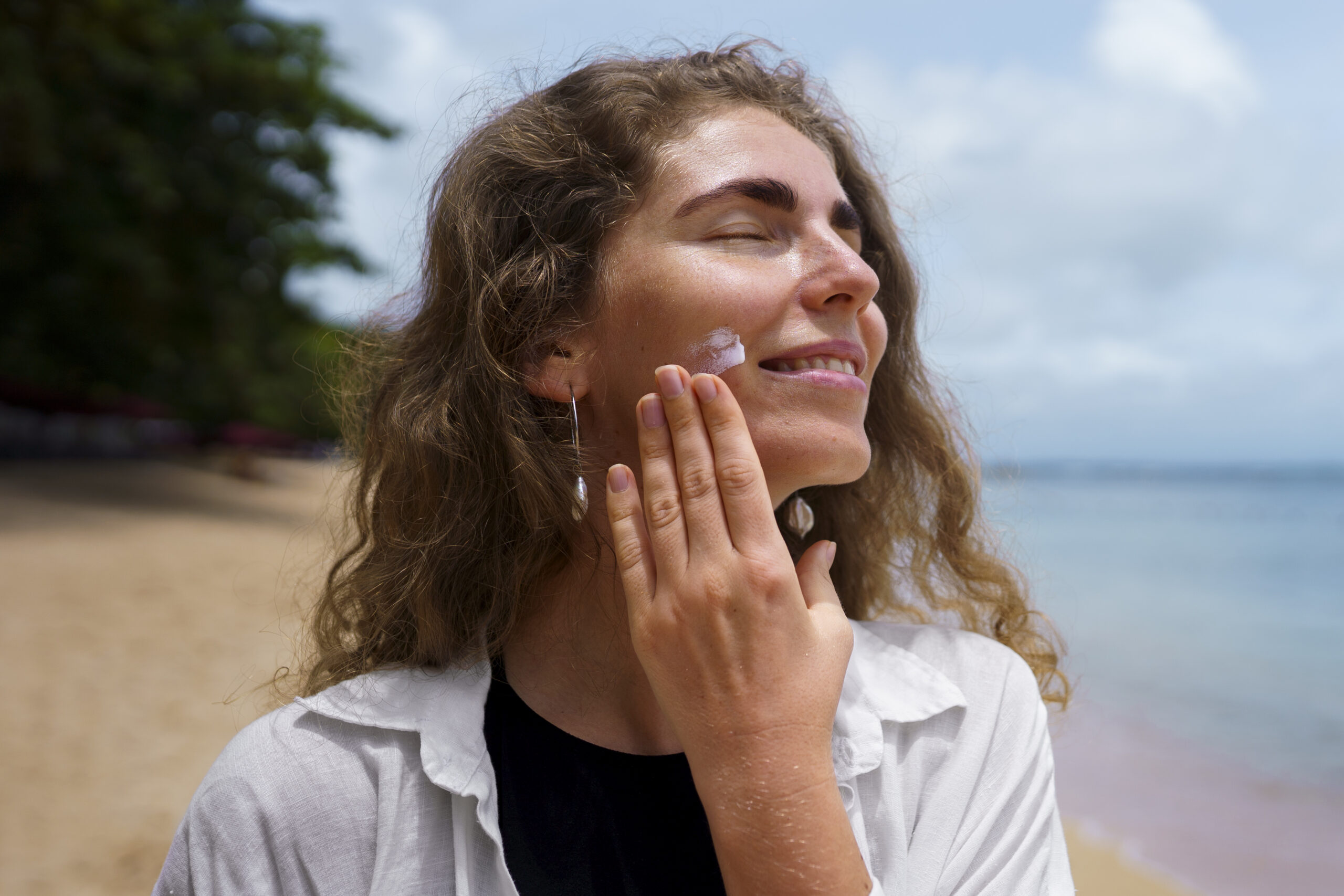 UV Rays + Sunscreen Protection Concept